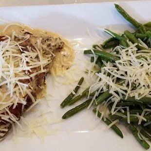 Chicken Marsala and fresh green beans; both topped with fresh grated parmesan cheese.  WOW, it is FABULOUS tasting! I love this place!