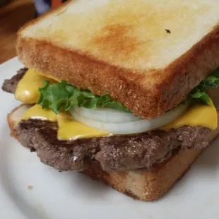 a sandwich with cheese and lettuce
