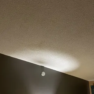 Stains on the ceiling in the bedroom