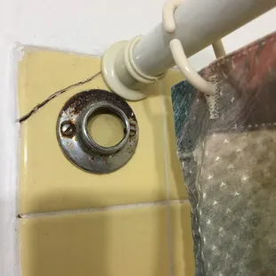 Broken Tile / Shower Rod Holder
