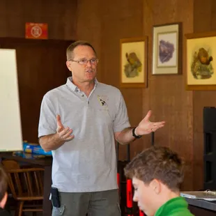 Mark Phelps helps another group of young hunters complete their Hunter's Safety class.