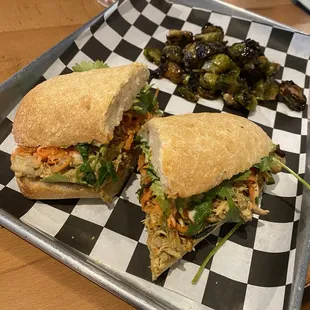 Curried chicken bahn mi with sprouts