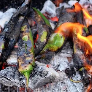 Fire-roasting Hatch Chilies is the proper way to do it. :)