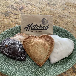 3 hand pies: chocolate cherry, fig raspberry, lemon blueberry