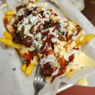 french fries with ketchup and cheese