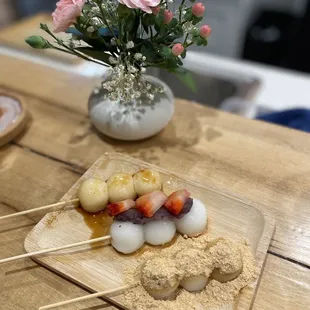 Dango (3 piece): soy sweet glaze, anko with strawberries, and kinako