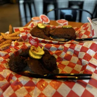 Damn hot wings (foreground) Large dark (back)