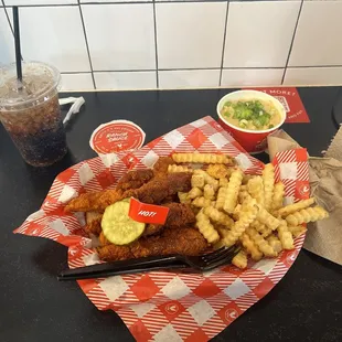 Hot tenders with fries and side of bacon cheddar grits