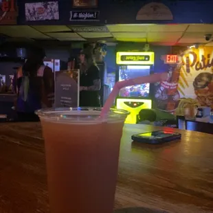 a drink in a plastic cup