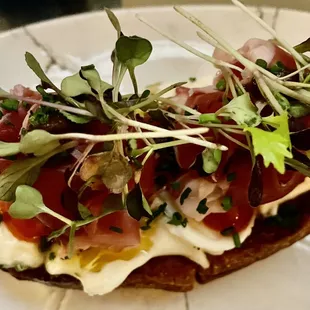 Burrata toast with prosciutto