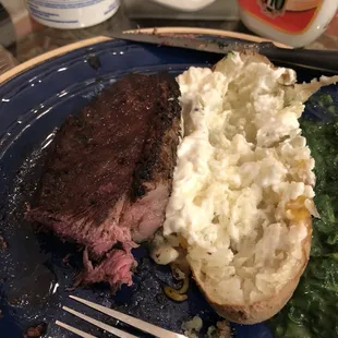 Ribeye with loaded baked potato