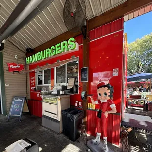 a statue of a man in a santa suit