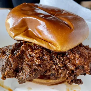 a fried chicken sandwich on a bun