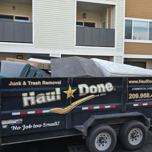 Haul Done trailer filled with furniture, mattress's, &amp; misc junk. Pictures was taken before we rolled the tarp over the top.