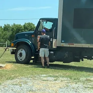 My husband giving the movers directions to our son's house just before they headed out.