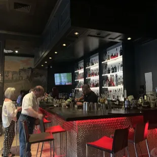 Female bartender with a horrible attitude.