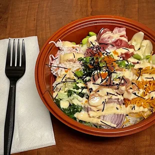 Build your own poke bowl with 2 proteins - ahi and spicy tuna.