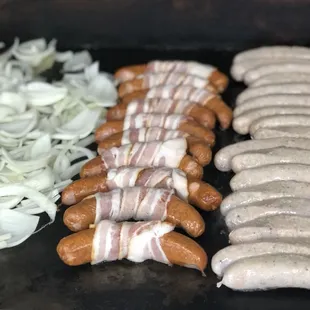 Brats and Überbrats fresh on the grill!