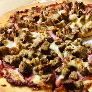 Toppings: meatball, Canadian bacon, sausage, and salami