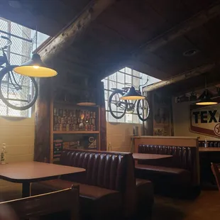 a bicycle hanging from the ceiling