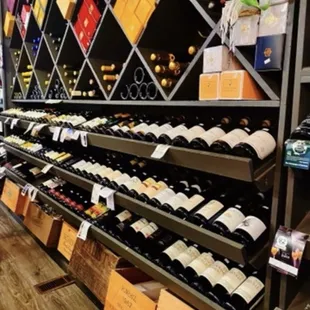 a wine rack with bottles of wine