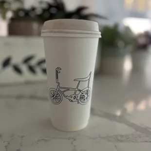 Coffee to go cup with banana seat bike