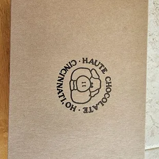 a brown box with a logo on it