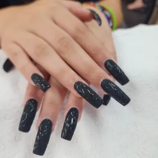 Black matter with design.