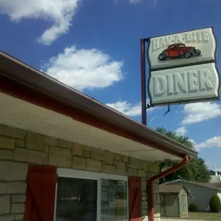 a sign for a diner
