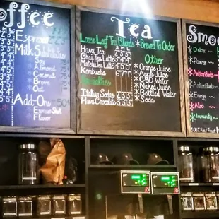 menus on the wall of a coffee shop