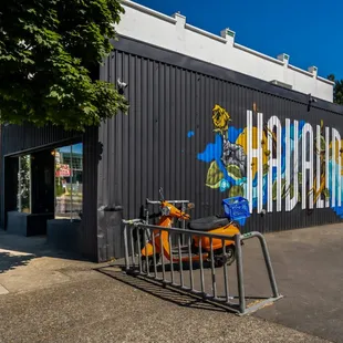 a motorcycle parked in front of a building