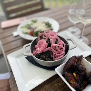 Crispy pork, side salad and plantains