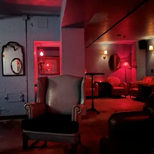 a leather chair in a dimly lit room