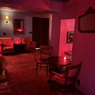 a red light in a dimly lit room