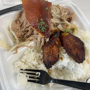 Lechon, staple of island people. The best I&apos;ve had in the states