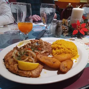 # 29 porkchop with yellow rice and sweet plantains