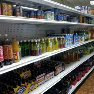 shelves of soda, soda, and other beverages