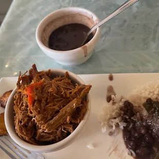 Shredded beef, rice, beans and plantanos