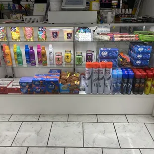 a display of sodas, snacks, and other beverages