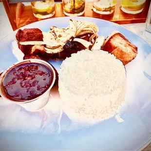 Lovely combination of the perfect sticky rice, fried plantains, black beans &amp; marmated pork cubes battered &amp; fried to a golden, zesty brown!