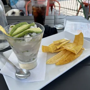 Fish ceviche with fried plantains.