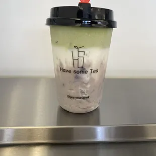 taro milk with matcha milk cup