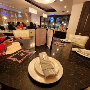 a table setting with a menu
