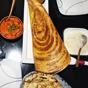 Fish tikka masala, garlic naan, and massive masala dosa!