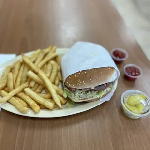a plate of fries and a sandwich