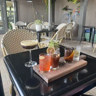 Outside seating. Cocktail flight (who knew they had these?!?) and my espresso martini.
