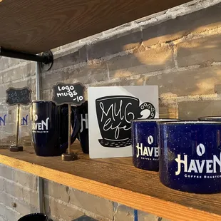 coffee mugs on a shelf