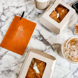 a table with coffee and pastries