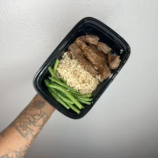Teriyaki steak (sugar free) paired with brown rice and green beans.
