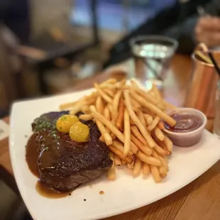 NY Strip Steak 12oz $44. Peppercorn sauce, fries